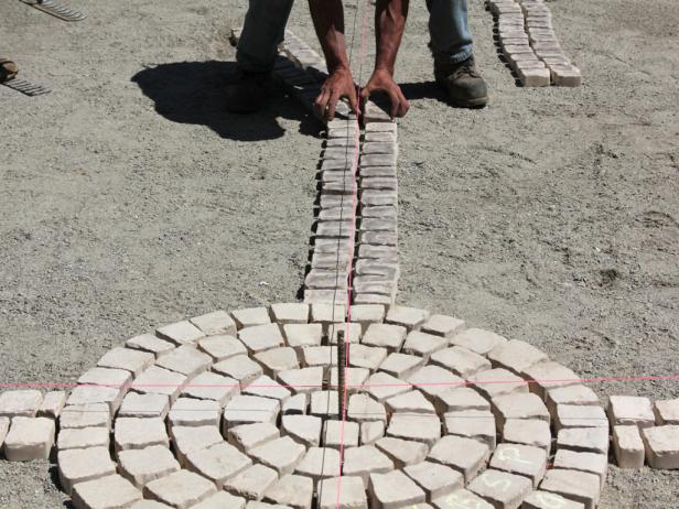Lay the First Stones Check stones for alignment.