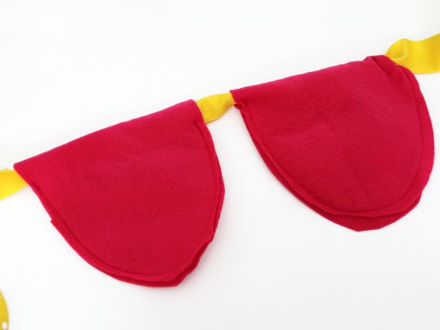 Sewed fabric petals strung on ribbon