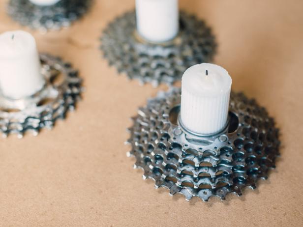 Step 4: Insert candle into center of gears. Step 4: Insert candle into center of gears.