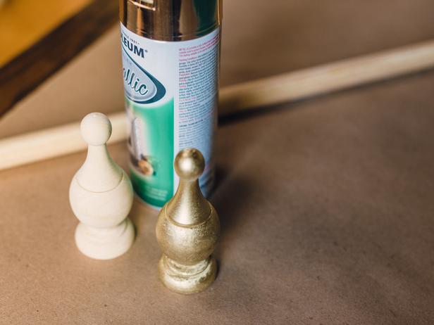 Gold Spray Paint Adds Flair to the Wood Rod Gold Spray Paint Adds Flair to the Wood Rod