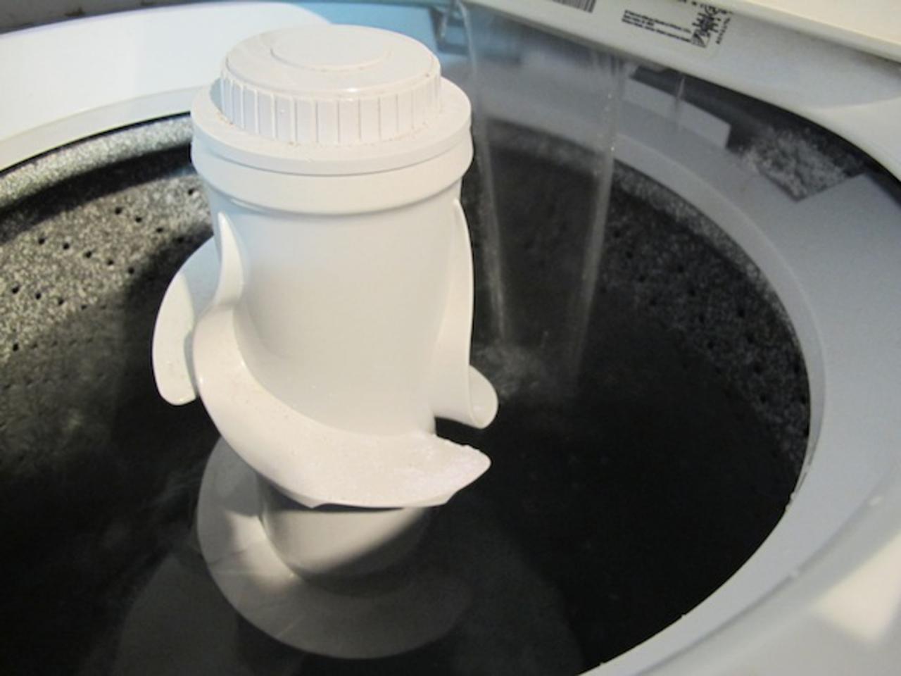 How do you clean a Kenmore washing machine?