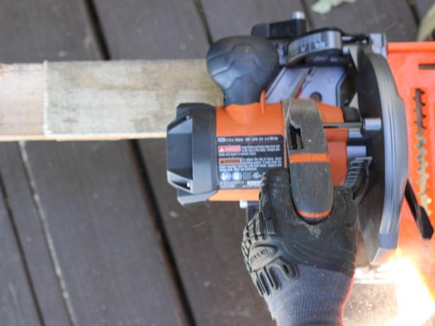 Use circular saw to cut the front and back planks to the proper height and width.