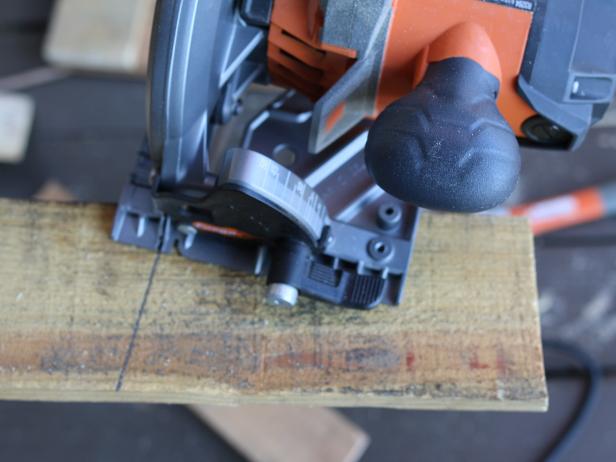 Use circular saw to cut planks for side panels.