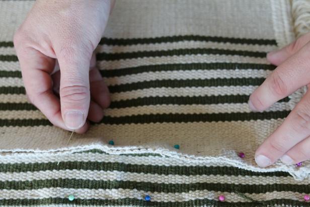 Use the sewing pins to temporarily attach each of the four side panels to the top panel. Leave one of the four panels unstitched so the pet bed can be inserted.