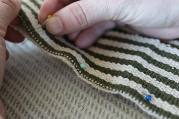 Use the sewing pins to temporarily attach each of the four side panels to the top panel.