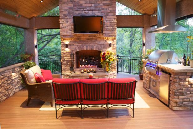 Stone Fireplace and Outdoor Kitchen at Dusk Stone Fireplace and Outdoor Kitchen at Dusk