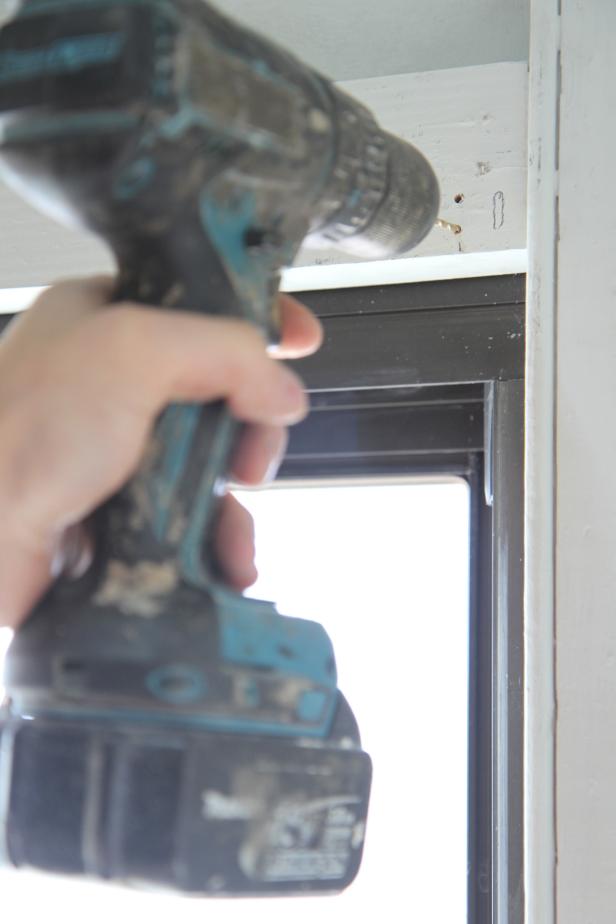 Pre-drill holes for bracket screws based on pencil marks.