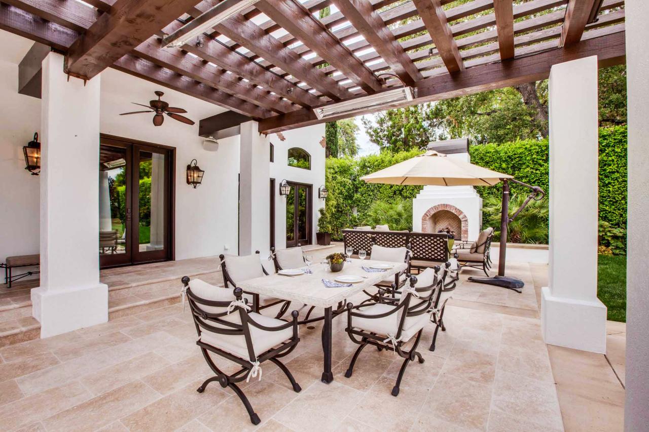 SpanishStyle Back Patio With Statement Making Pergola Photos DIY