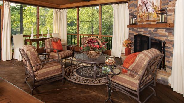 Rustic Screened Porch with Stone Fireplace Rustic Screened Porch with Stone Fireplace