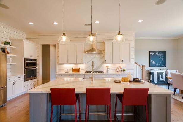 Light Transitional Kitchen with Shiplap Walls and an Island with Red Leather Barstools
Light Transitional Kitchen with Shiplap Walls and an Island with Red Leather Barstools