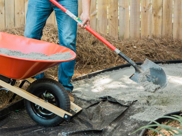 Step 5- Add Sand & Tamp DownWith the weed block material in place, spread a few inches of sand out, making sure to keep it somewhat level. For better drainage, try to make the middle of the pathway a bit higher than the sides for better run off. Tamp sand down for compaction.