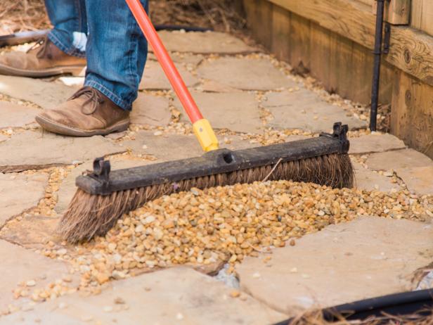 Step 7- Add PebblesOnce all the flagstone is in place, spread the pebbles out and sweep into the gaps with a wide broom. This will provide a unique texture, better water absorption and help keep the stones tight over time. Enjoy!