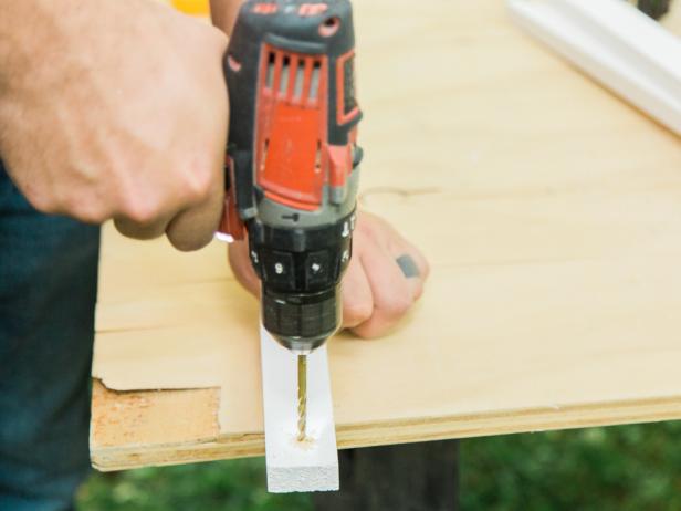 Step 2- Cut & Install 1x2 LedgeFirst, measure the depth and width of the space to get the 1x2 ledge dimensions . Measure, mark and cut the primed 1x2. Next, to prepare the 1x2 boards for the wall, drill pilot holes and use a larger bit to prep them for countersinking your screws. Make sure each ledge is level on the wall before installing into the studs using 2 ½ inch wood or drywall screws .