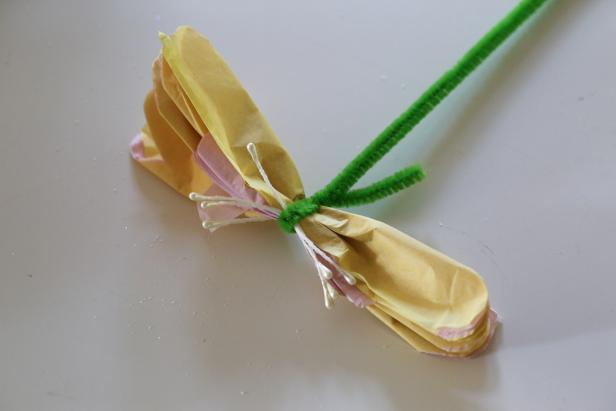 Add the Stamens to the Tissue Paper Peonies The stamen are added to the center of the flower with a pipe cleaner.