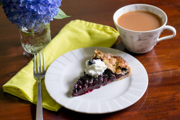 Enjoy Blueberry Crostada with Whipped Cream and a Cup of Tea Enjoy Blueberry Crostada with Whipped Cream and a Cup of Tea