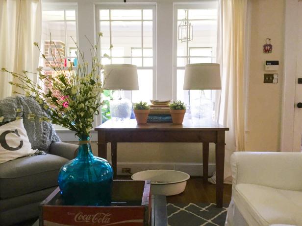 Console Table with Clear Lamps in Sunlit Living Room Console Table with Clear Lamps in Sunlit Living Room
