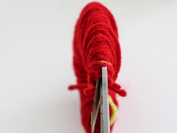 Strawberry Pom Pom Yarn is Cut Strawberry Pom Pom Yarn is Cut
