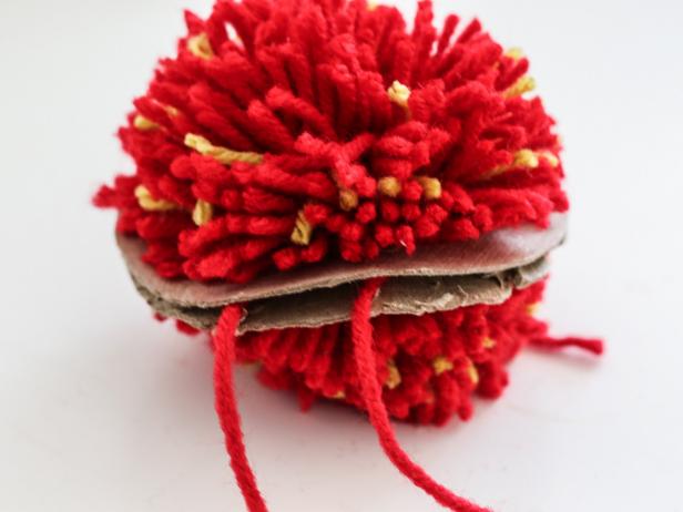 Strawberry Pom Pom is Tied Off Strawberry Pom Pom is Tied Off