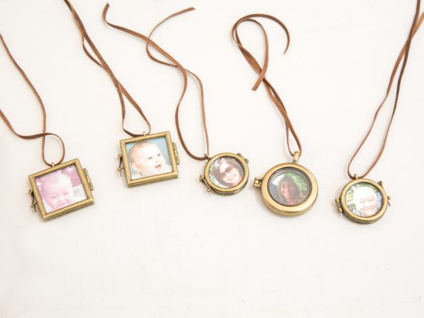 Step 3: Frame and Tie Insert pictures into the lockets. Cut the leather string at about 8” length, thread it through the locket loops and securely tie the string on the branch.