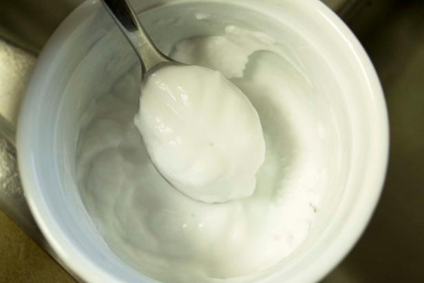 Bowl of Baking Soda Paste and Spoon