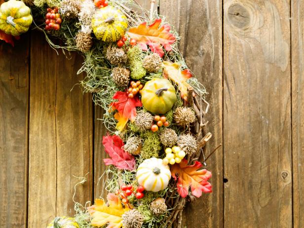 Acorn, Berries, Leaves and Moss Add Fall Flair to Wreath Up close Detail Shot of Wreath