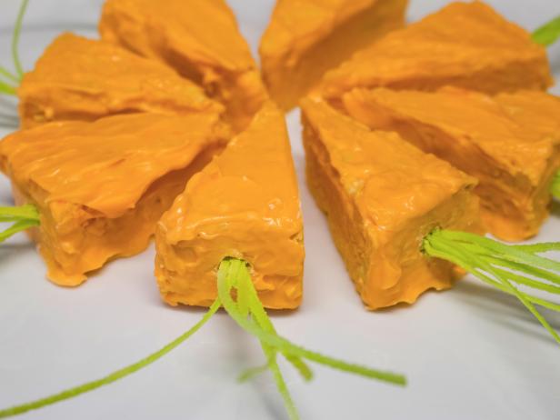 How to Make Easter Bunny-Approved Carrot Treats DIY crispy carrots covered in orange-colored chocolate.