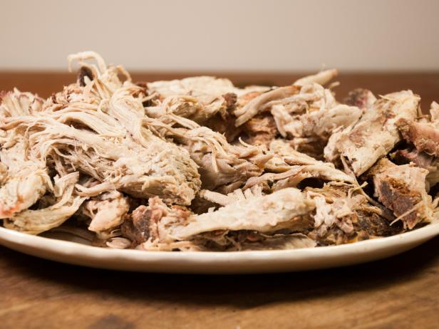 A Plate Of Pulled Pork Shoulder, Smoked Over Hickory Chips A Plate Of Pulled Pork Shoulder, Smoked Over Hickory Chips