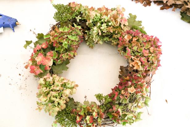 Add Dried Hydrangeas to the Wreath Add Dried Hydrangeas to the Wreath