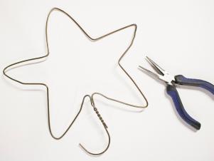 Bend a Metal Hanger into a Star Tree Topper Bend a Metal Hanger into a Star Tree Topper