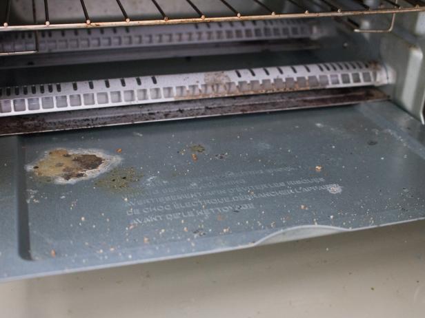 Dirty Spots in the Kitchen You're Overlooking Remember to clean these spots in the dishwasher, the toaster oven, and around the stovetop.