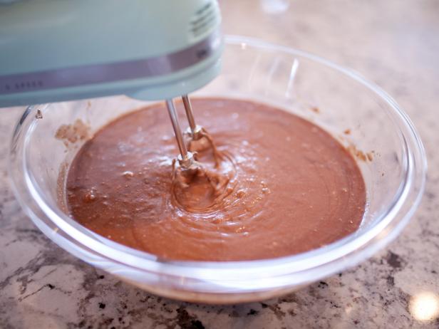 Mix Ingredients to Form Cake Batter Chocolate Cupcake Batter in Glass Bowl