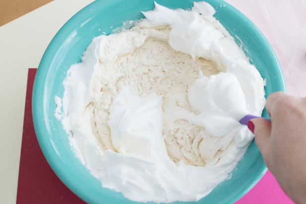 Making puffy paint for DIY Valentine's Day cards.
