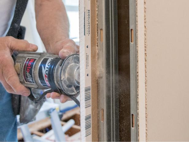 You may wish to use a drywall router to cut openings for windows, doors and other large openings.