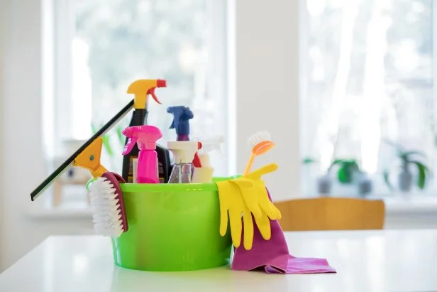 Basket with cleaning supplies