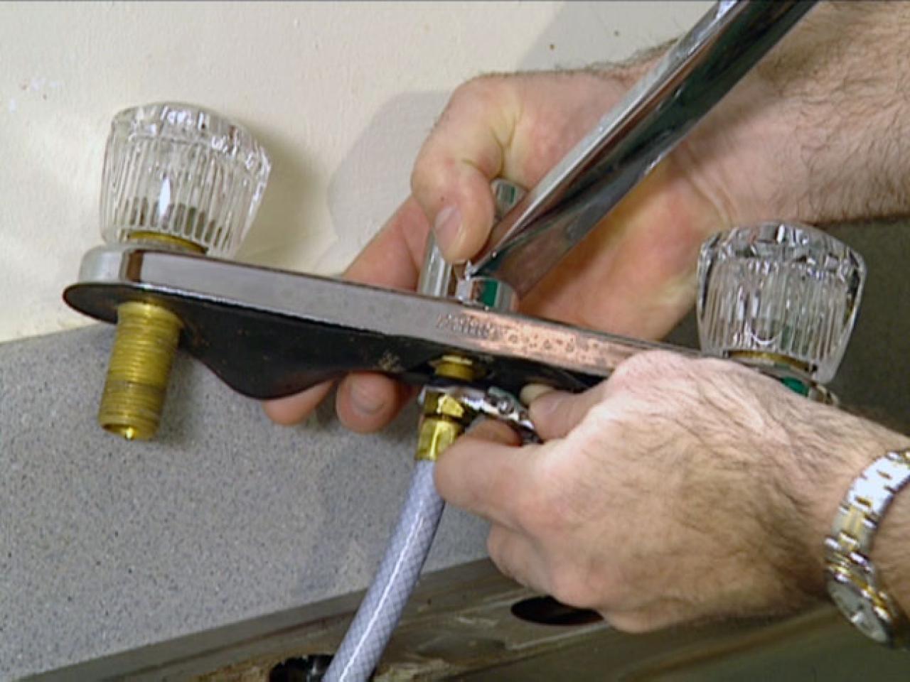 attaching a faucet to a kitchen sink