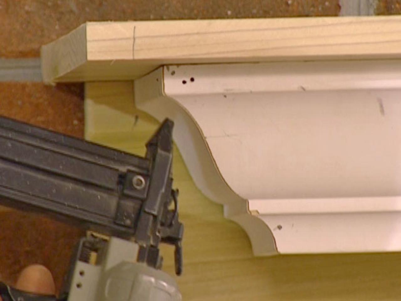 The DIYNetwork.com remodeling experts show how to create a fresh new fireplace out of standard lumber and crown molding.