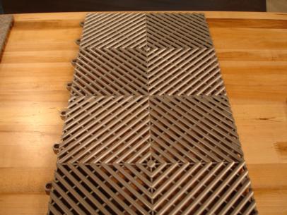 flooring made of durable plastic instead of rubber