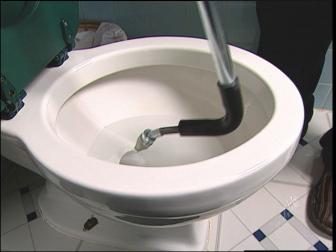 use toilet auger to snake for clogs in toilet