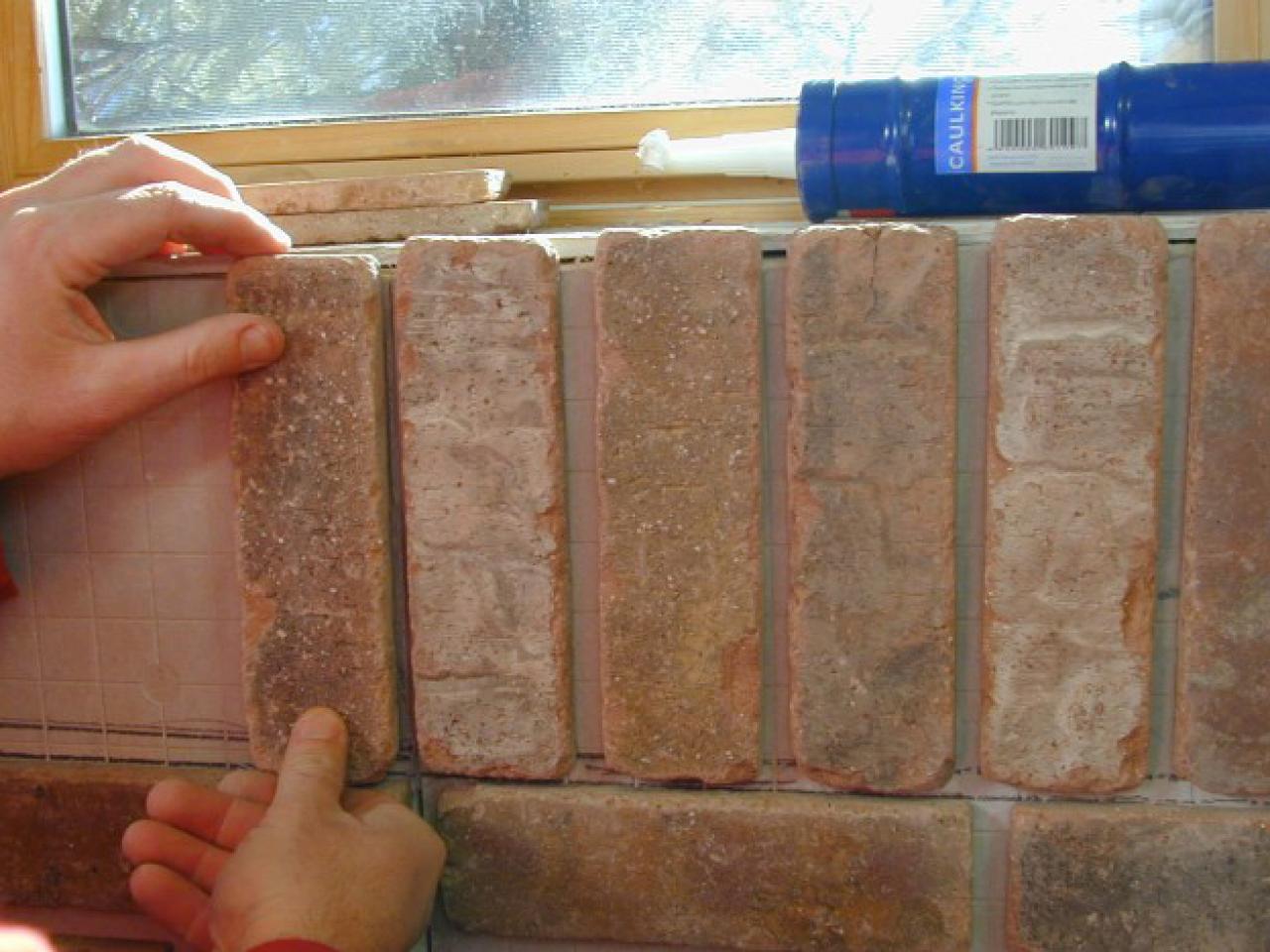 Follow these instructions from the DIYNetwork.com professionals to attach a brick veneer pattern to an interior wall.