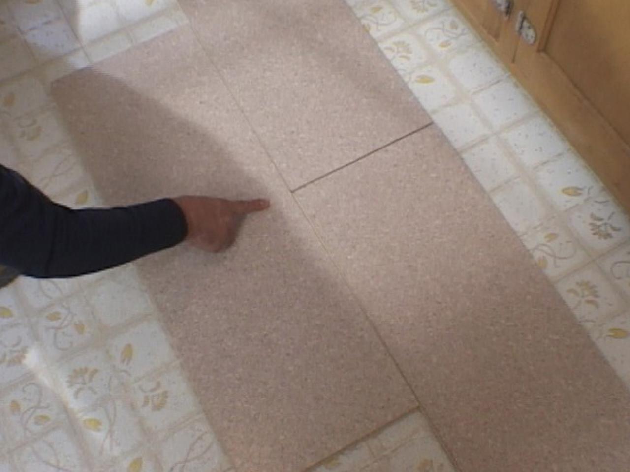 How To Install A Floating Cork Floor, How To Lay Laminate Flooring Over Tiles