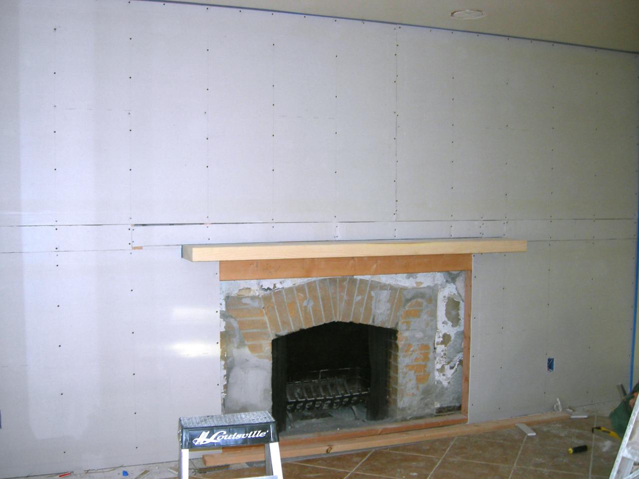 Build A Standard Wall Over Stone, How To Remove Fireplace Mantel From Drywall