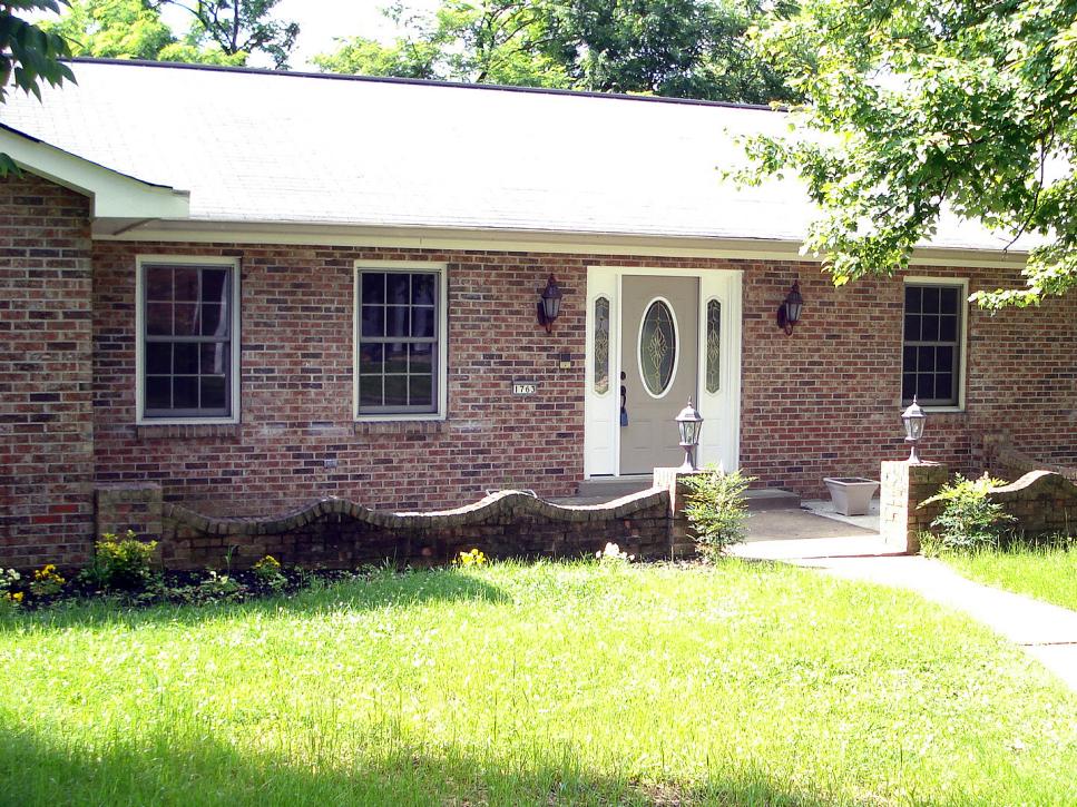 Curb appeal ideas before and after brick ranch home.