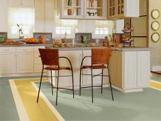 Kitchen with linoleum floor design by Armstrong with green and yellow color scheme. 