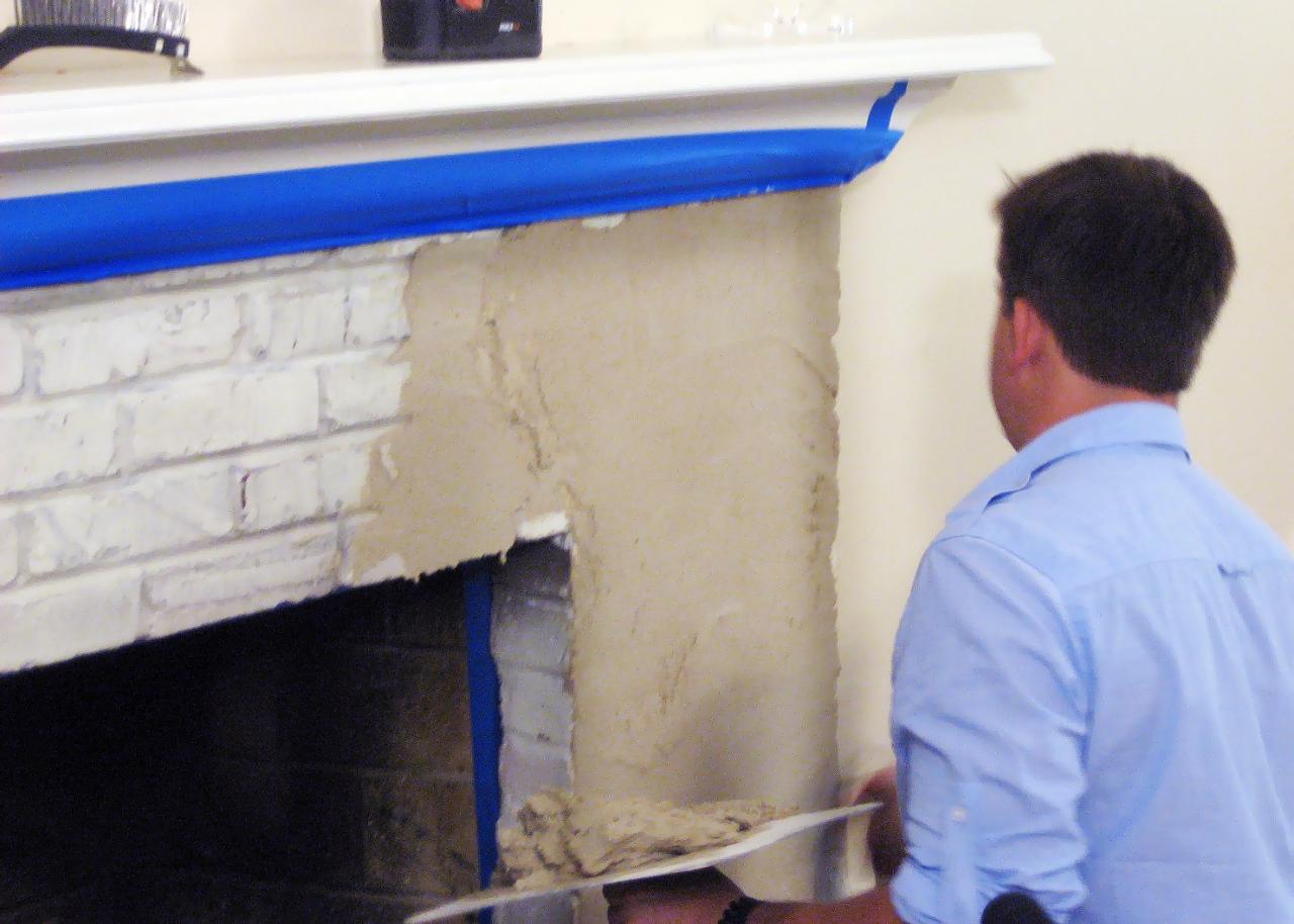 Give your fireplace a facelift with stucco. Learn how on DIYNetwork.com. It will take less than a weekend to do and cost less than $100.