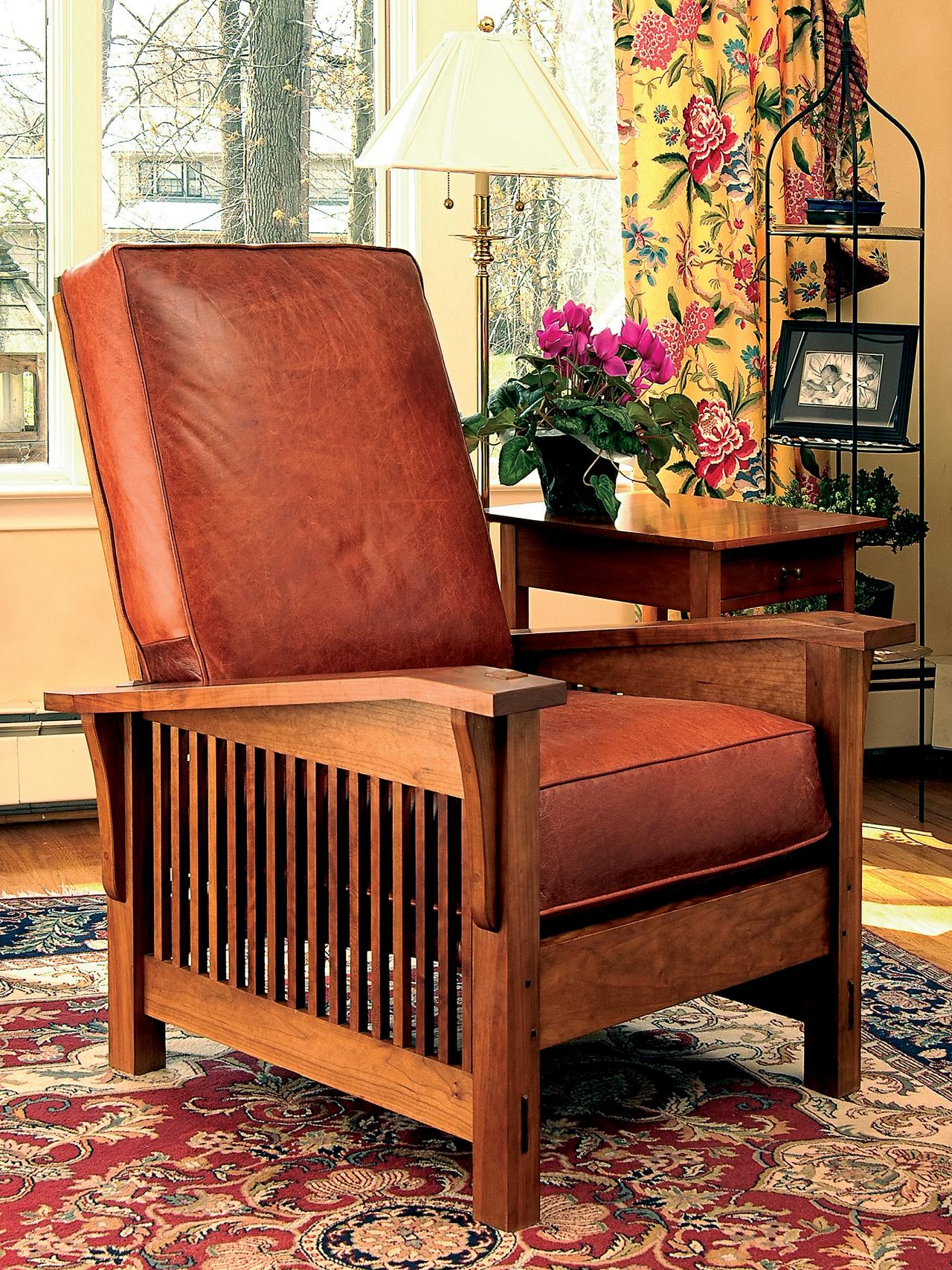 Old Wooden Chair Parts  . Leather And Wooden Chair On An Old Wooden Background.