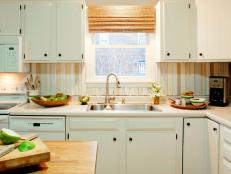 White Kitchen With Salvaged Wood Backsplash