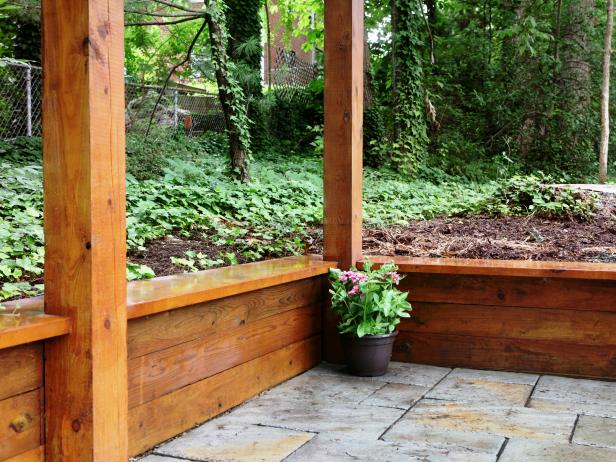 Building A Retaining Wall, How To Build A Fence With Landscape Timbers