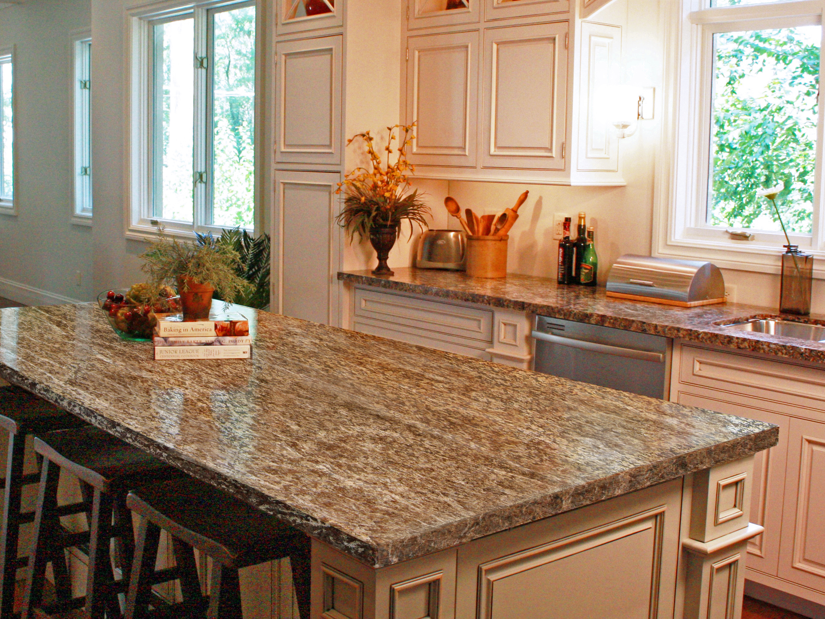 bathroom with vinyl plank flooring and granite countertops