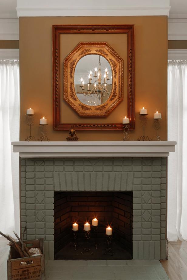 DIY Network has instructions on how to transform an old fireplace with new paint and molding.