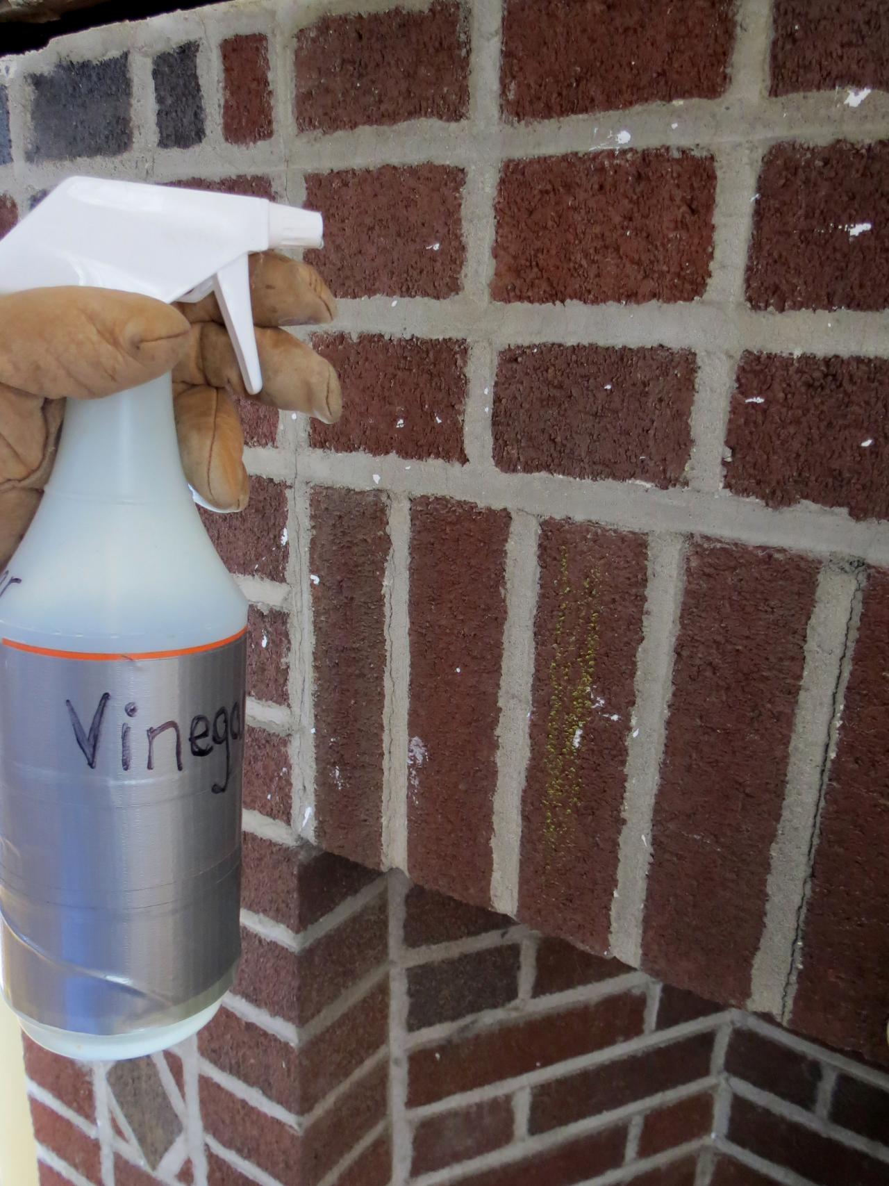 removing white paint from brick